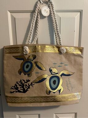 Greek Evil Eye Blue/Beige/Gold Turtle Themed 
22"x15" Tote
Imported from Greece